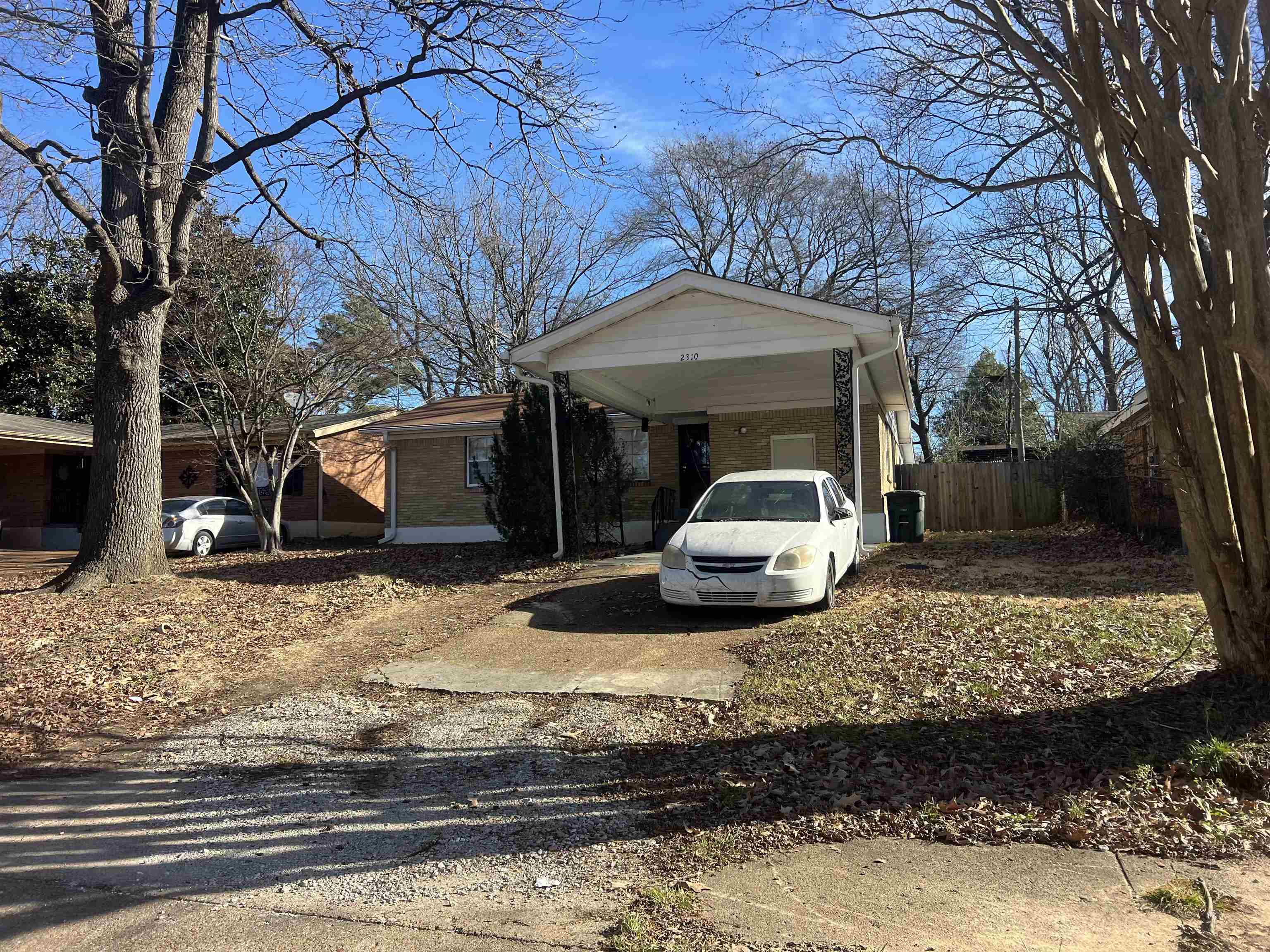 2310 Theda Avenue Memphis, TN 38127 - Photo 1 of 8 a front view of a house with cars parked