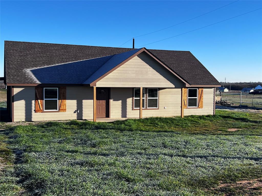 a house view with a garden space