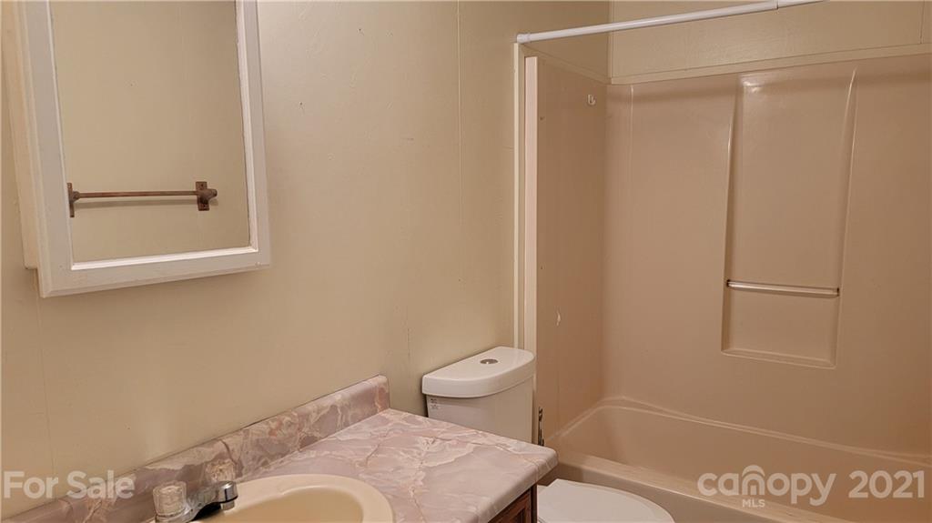 1108 Goldmine Road Chester, SC 29706 - Photo 7 of 17 a bathroom with a toilet and a shower