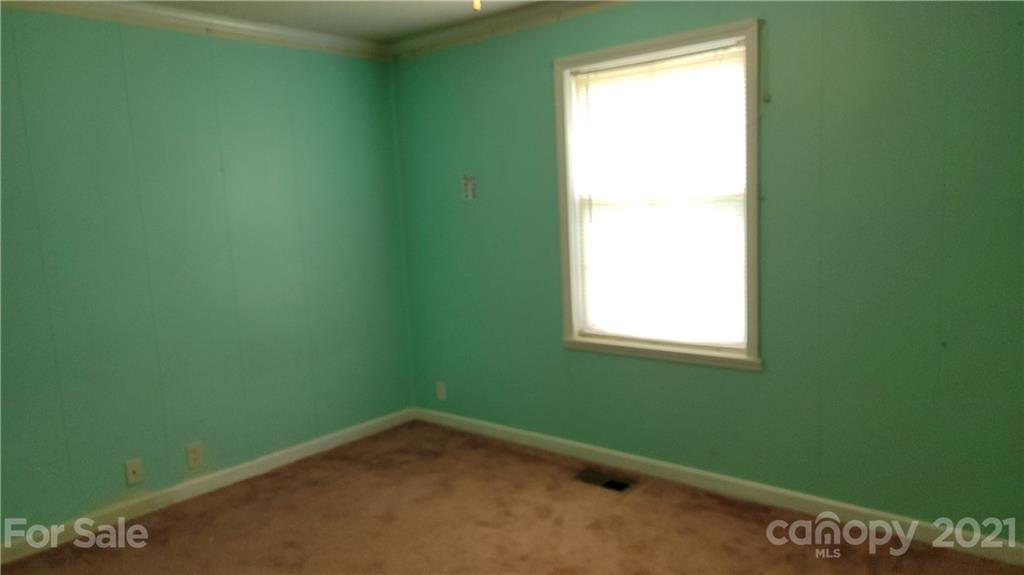 1108 Goldmine Road Chester, SC 29706 - Photo 8 of 17 a view of a small space with window and a fan