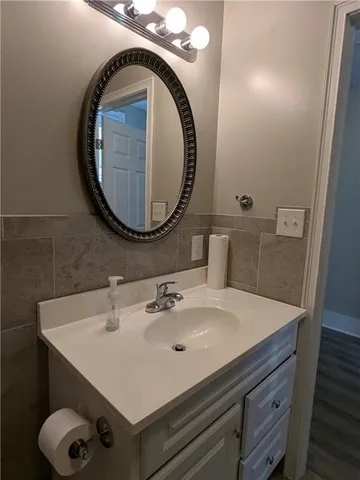 an entryway with washer and dryer