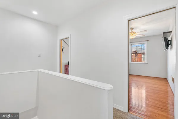 a view of a hallway with entryway