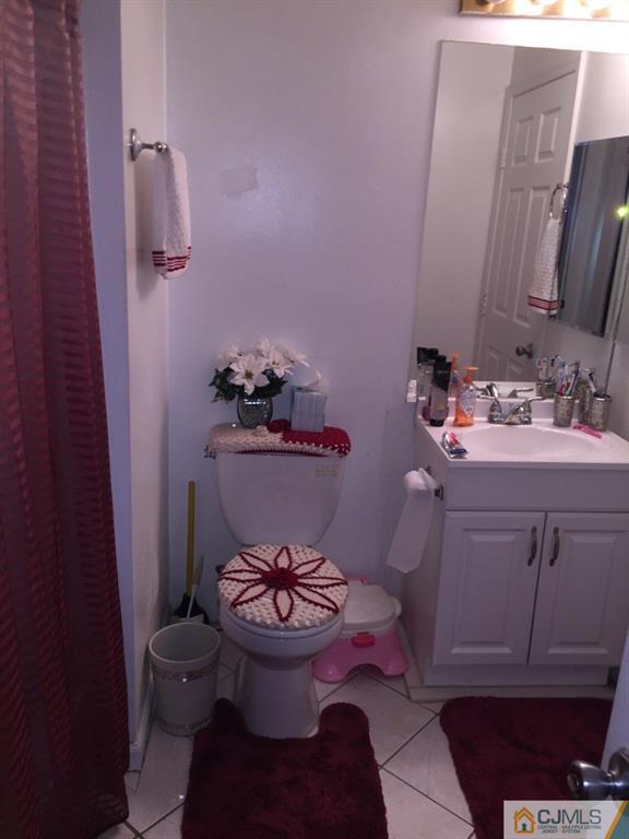531 Edpas Road, Unit 531 New Brunswick, NJ 08901 - Photo 9 of 9 a white toilet sitting next to a bathroom sink