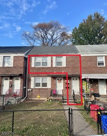 a view of a cafe with sitting area