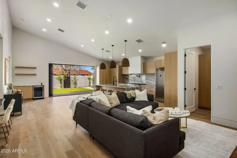 a living room with furniture and a table