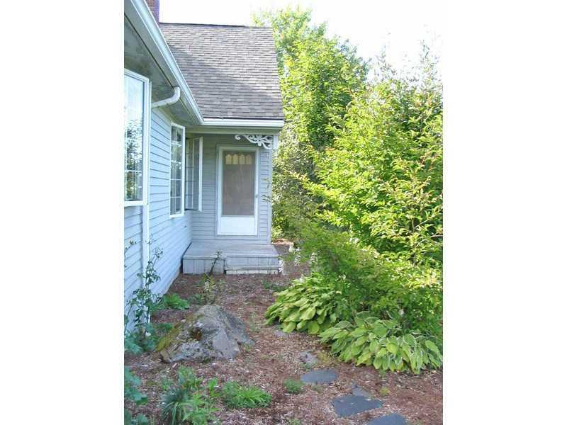 225 Pierce Road Brewer, ME 04412 - Photo 10 of 35 Exterior Front. A front yard garden...