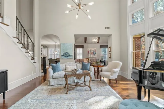 a kitchen with stainless steel appliances granite countertop a sink and stove
