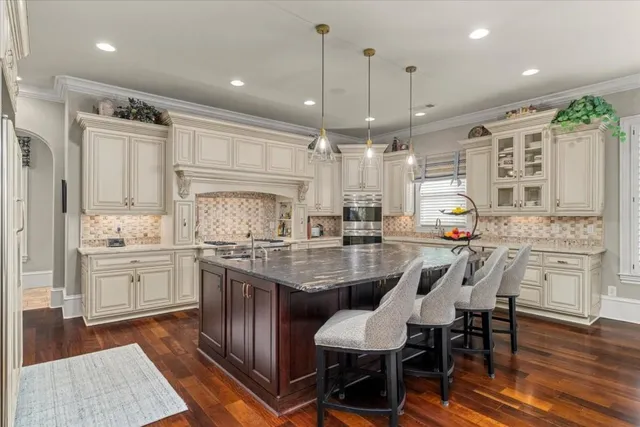 a bathroom with a toilet a sink and a mirror