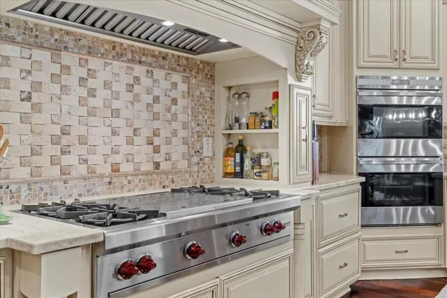 a view of swimming pool with lounge chair and trees