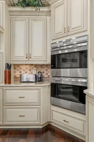 a view of living room with furniture and wooden floor