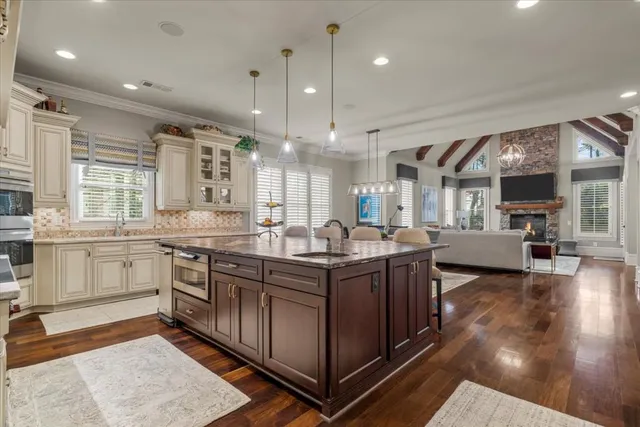 a view of a swimming pool with outdoor seating