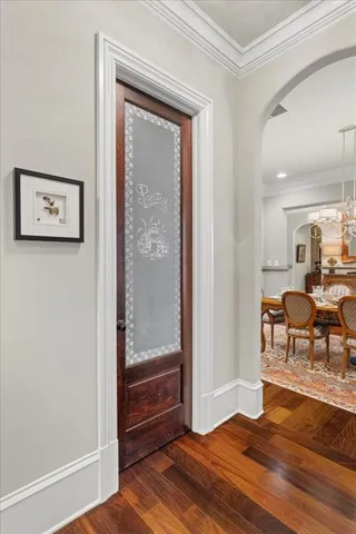 a spacious bathroom with double vanity and mirrors