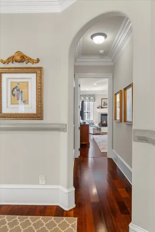 a bathroom with a granite countertop toilet a sink and a mirror