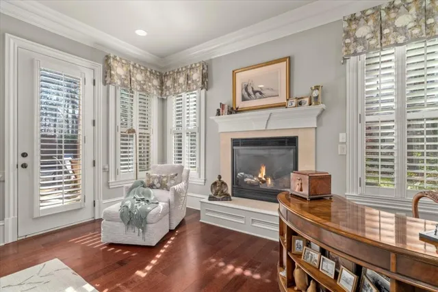 a view of a large yard with lots of plants and trees all around