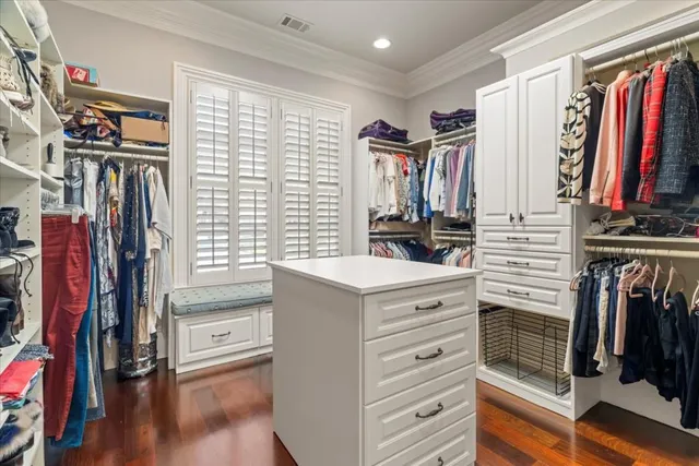 a view of a porch with furniture and a yard
