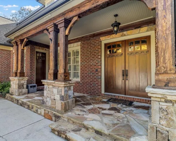 a view of living room with furniture and window