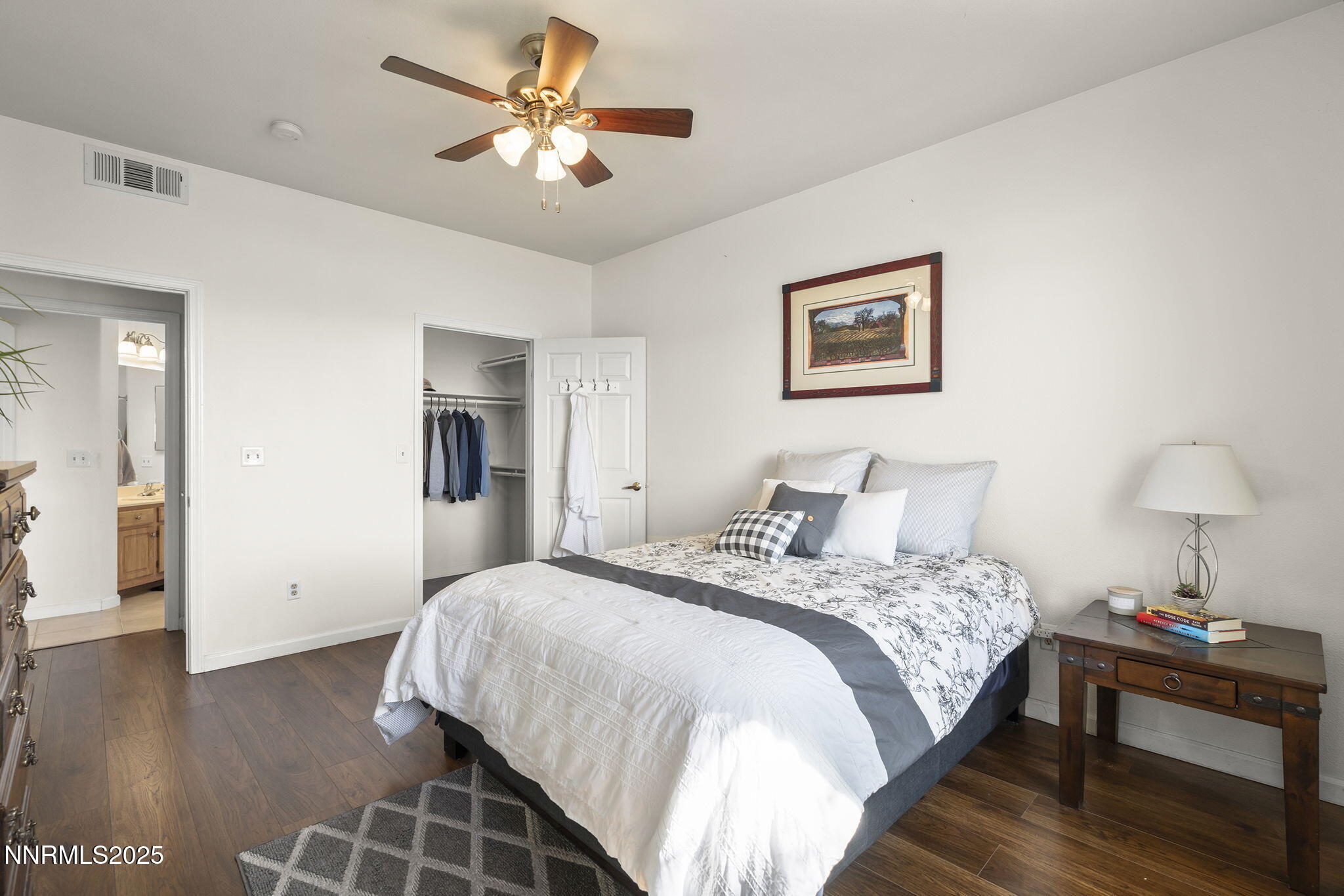 900 South Meadows Parkway, Unit 4313 Reno, NV 89521 - Photo 13 of 27 a bedroom with bed and a table