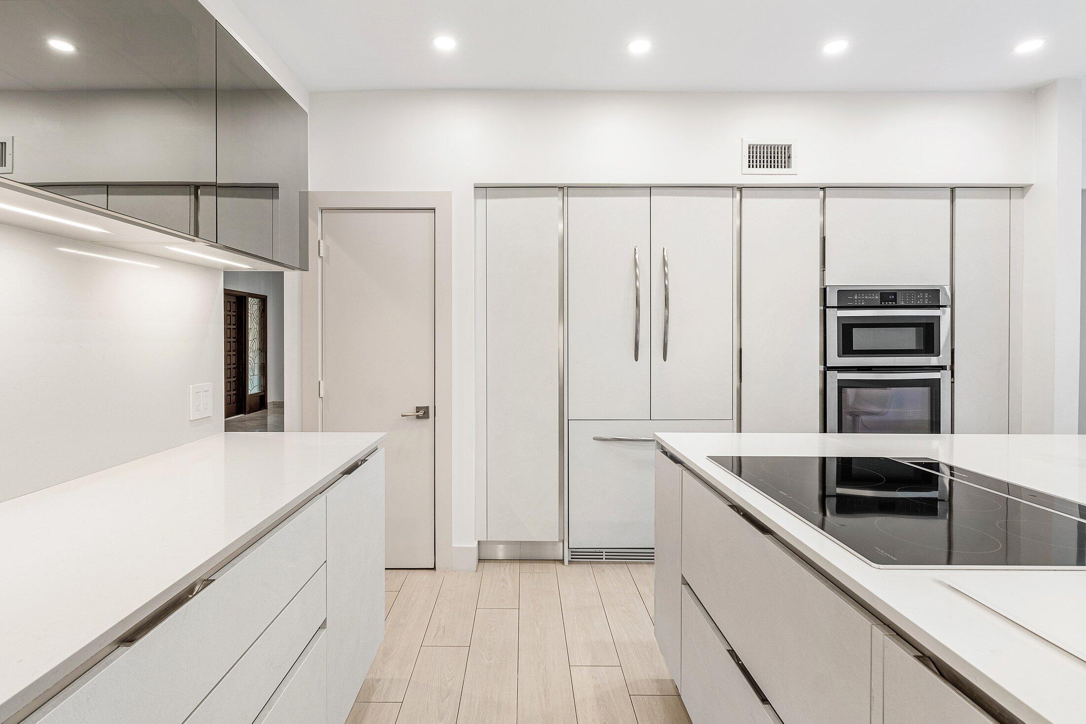 4140 Sanctuary Lane Boca Raton, FL 33431 - Photo 17 of 94 a kitchen with stainless steel appliances a refrigerator and a sink