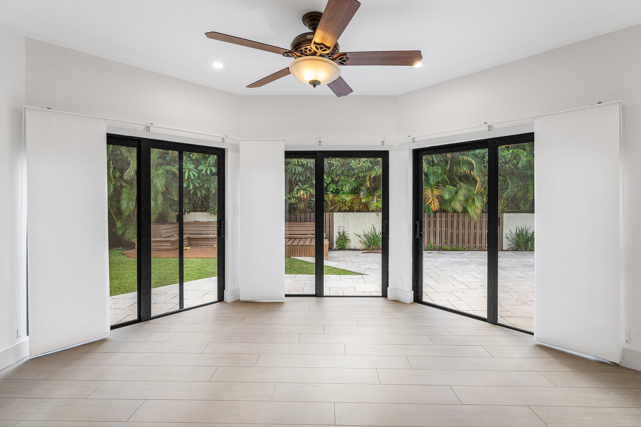 4140 Sanctuary Lane Boca Raton, FL 33431 - Photo 20 of 94 a view of a livingroom with a ceiling fan and window