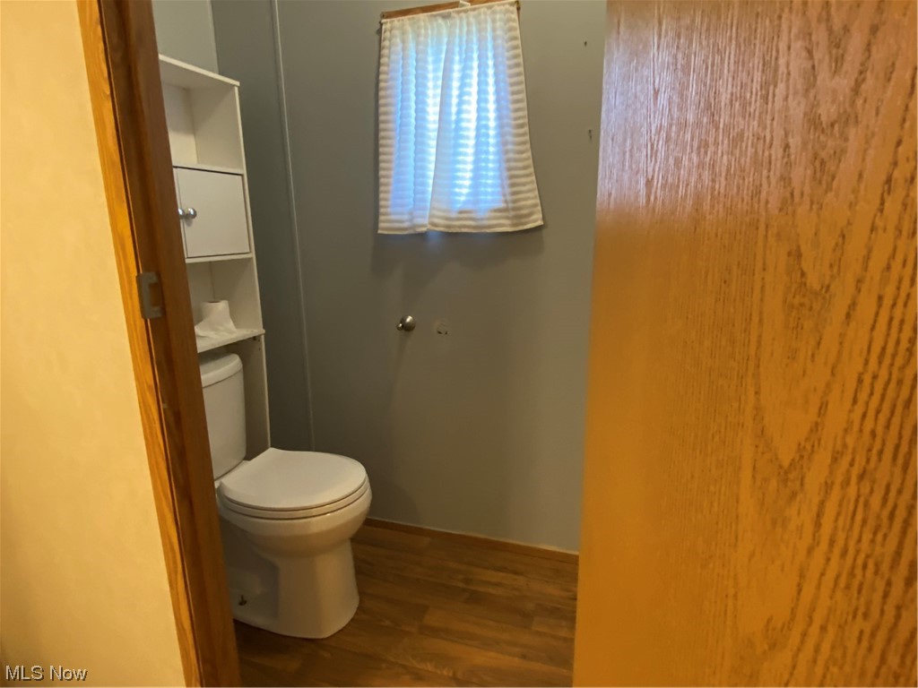 85 Rains Circle Zanesville, OH 43701 - Photo 13 of 15 Bathroom featuring wood-type flooring and toilet