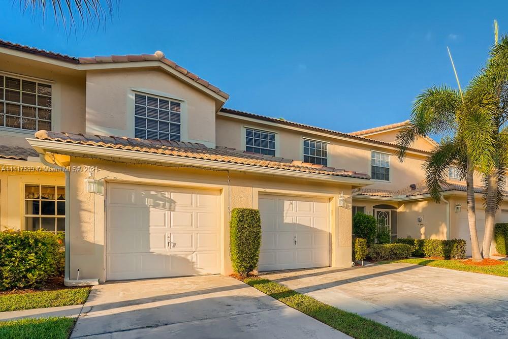 339 Timberwalk Trail Jupiter, FL 33458 - Photo 2 of 33 a view of a house with a patio