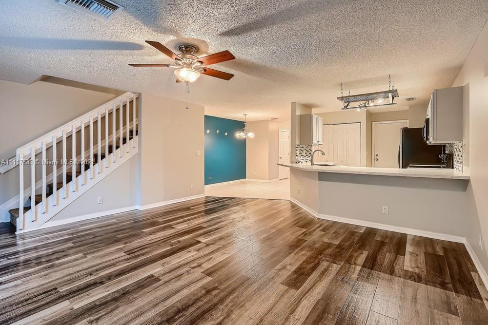339 Timberwalk Trail Jupiter, FL 33458 - Photo 7 of 33 a view of a kitchen from the kitchen