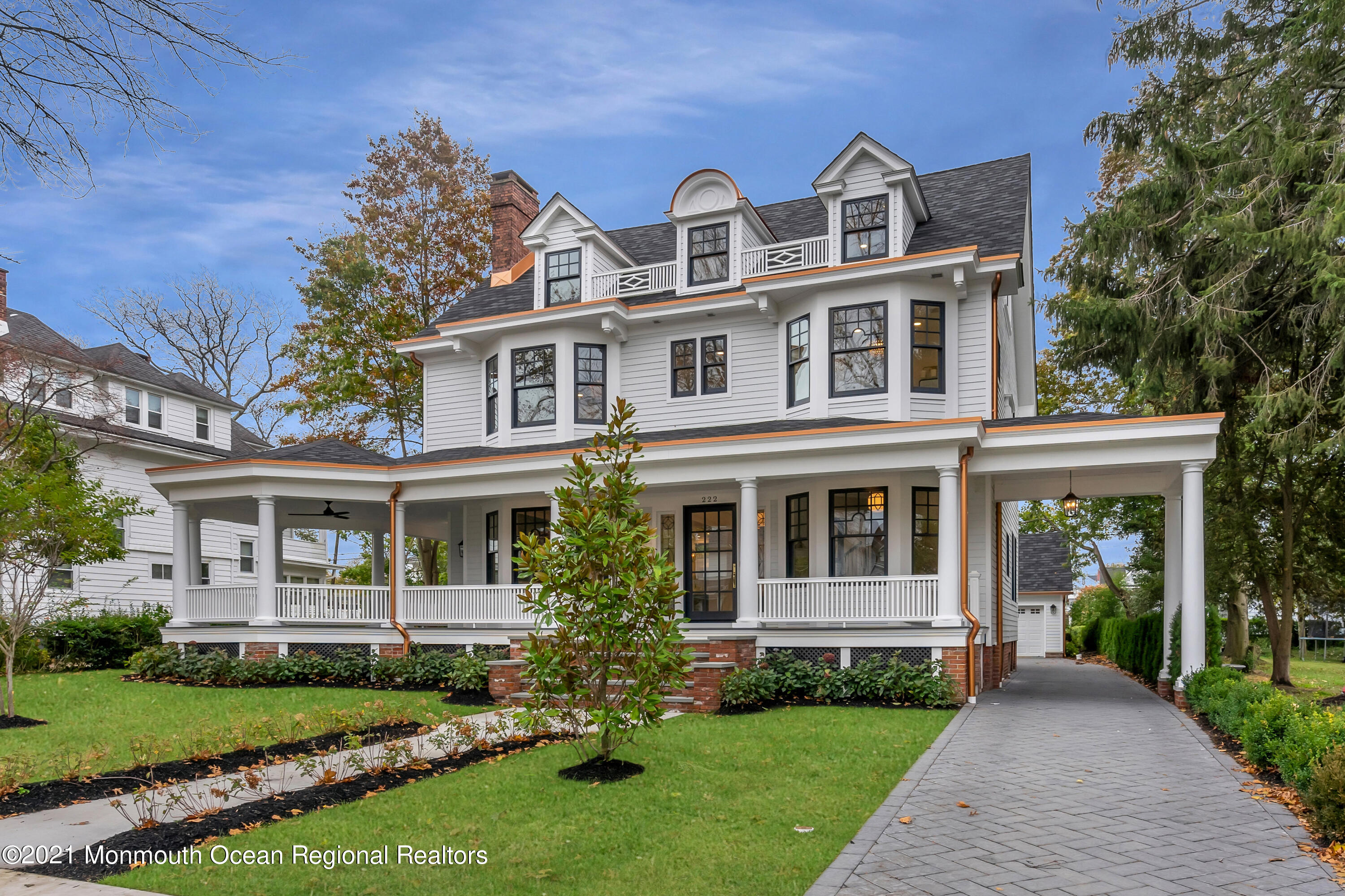 222 Cedar Avenue Allenhurst, NJ 07711 - Photo 2 of 73 front view of a house with a yard