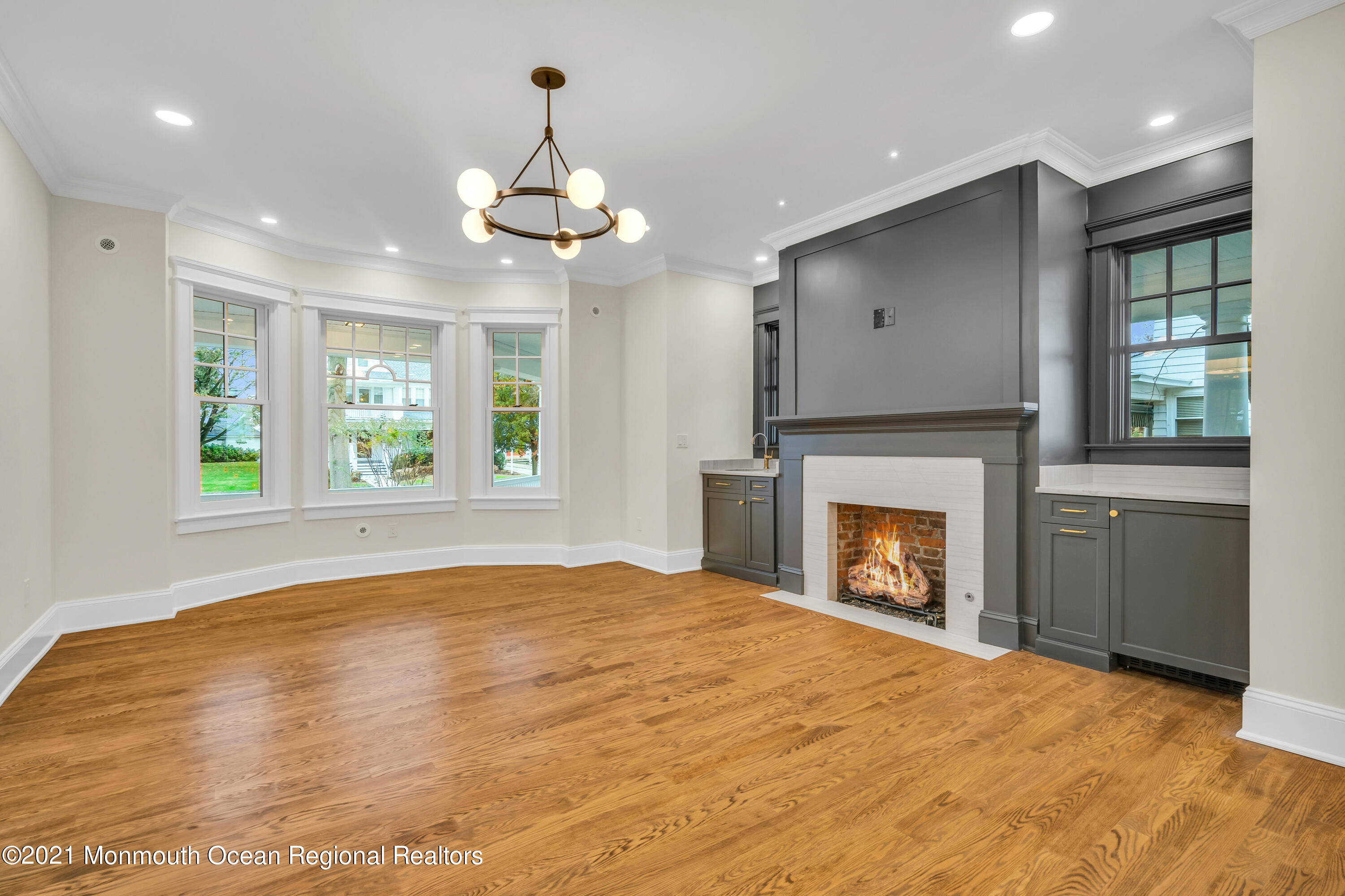 222 Cedar Avenue Allenhurst, NJ 07711 - Photo 16 of 73 a view of an empty room with window and fire place