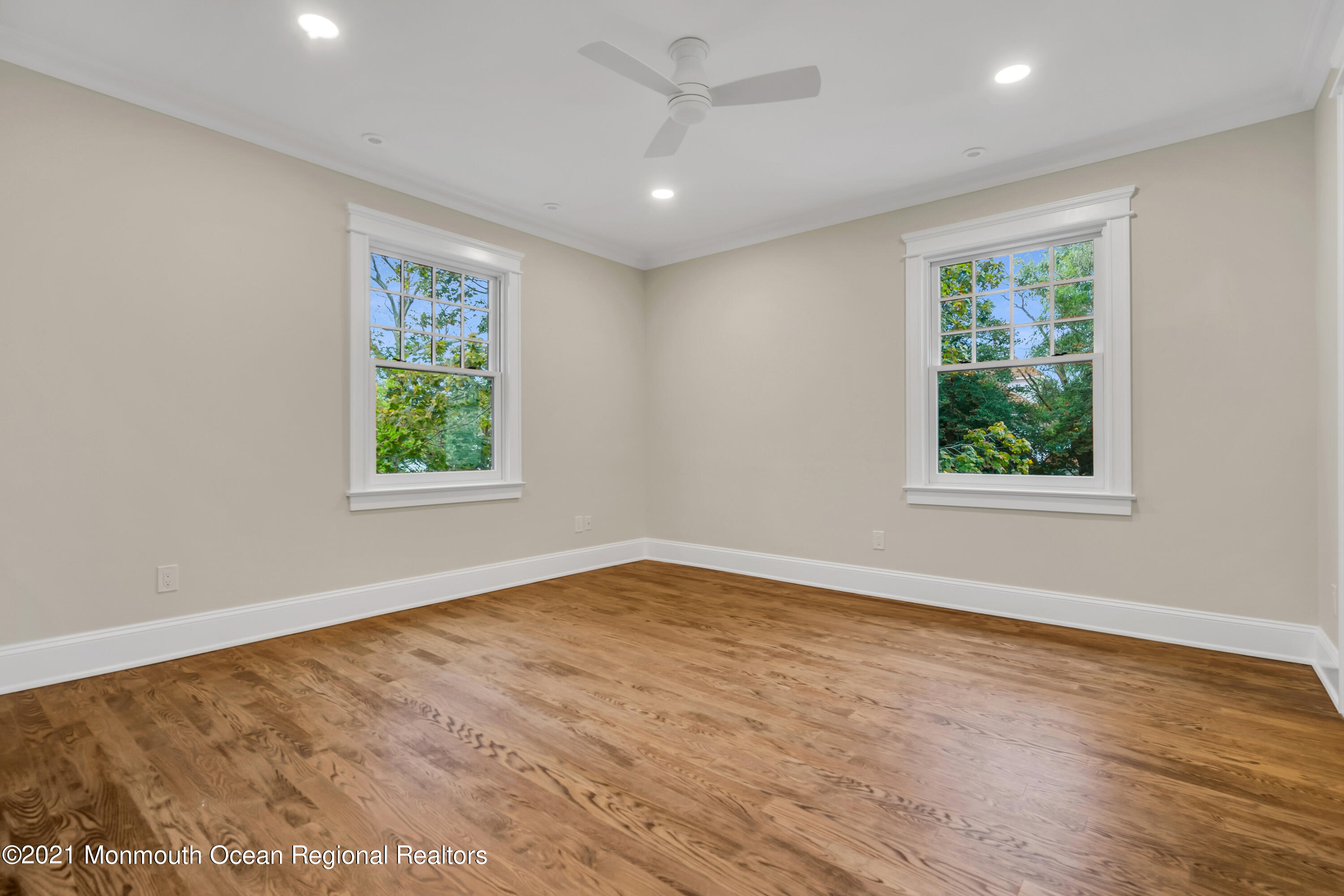 222 Cedar Avenue Allenhurst, NJ 07711 - Photo 37 of 73 wooden floor in an empty room with a window
