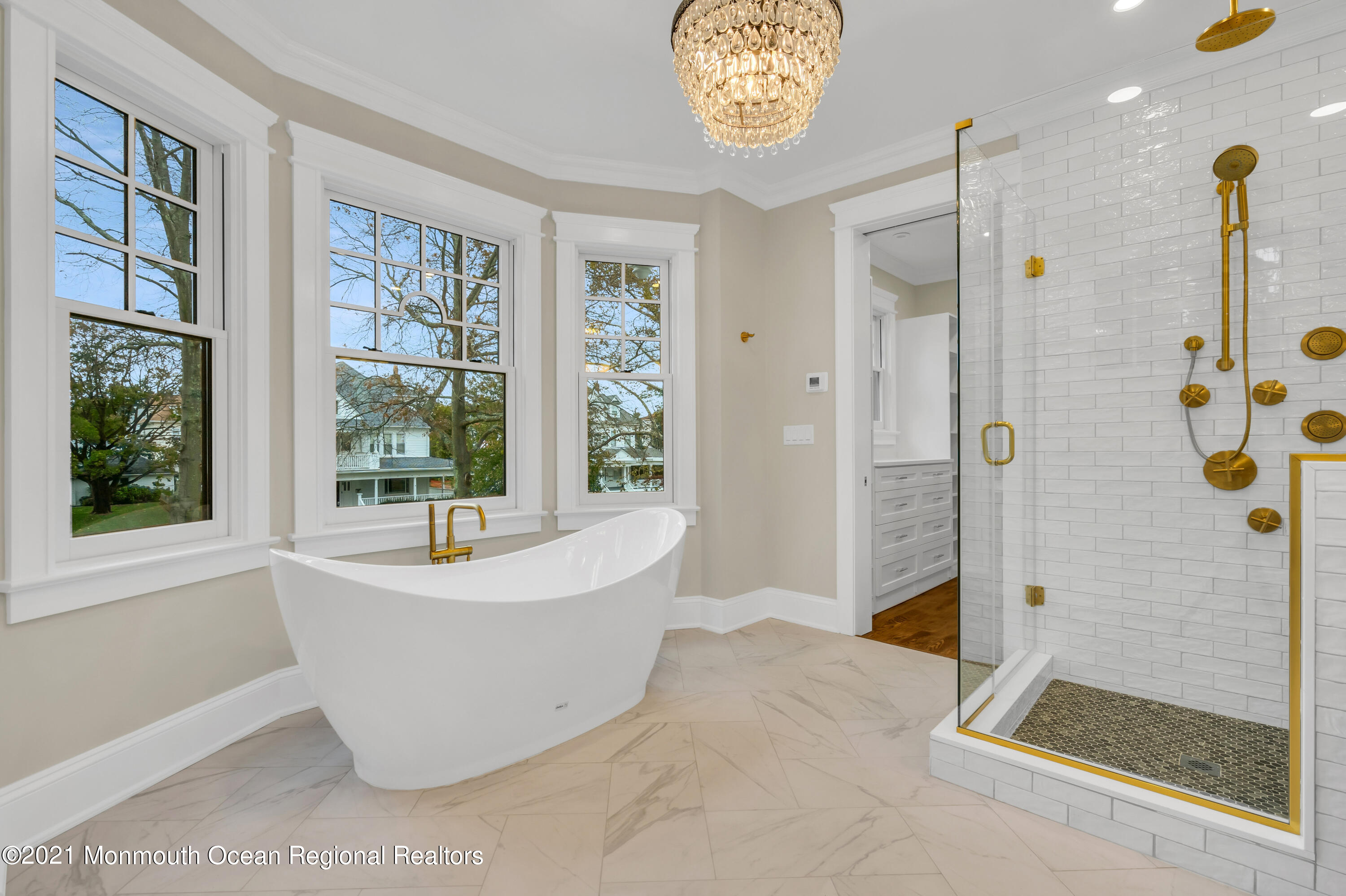 222 Cedar Avenue Allenhurst, NJ 07711 - Photo 52 of 73 a white bath tub sitting next to a window