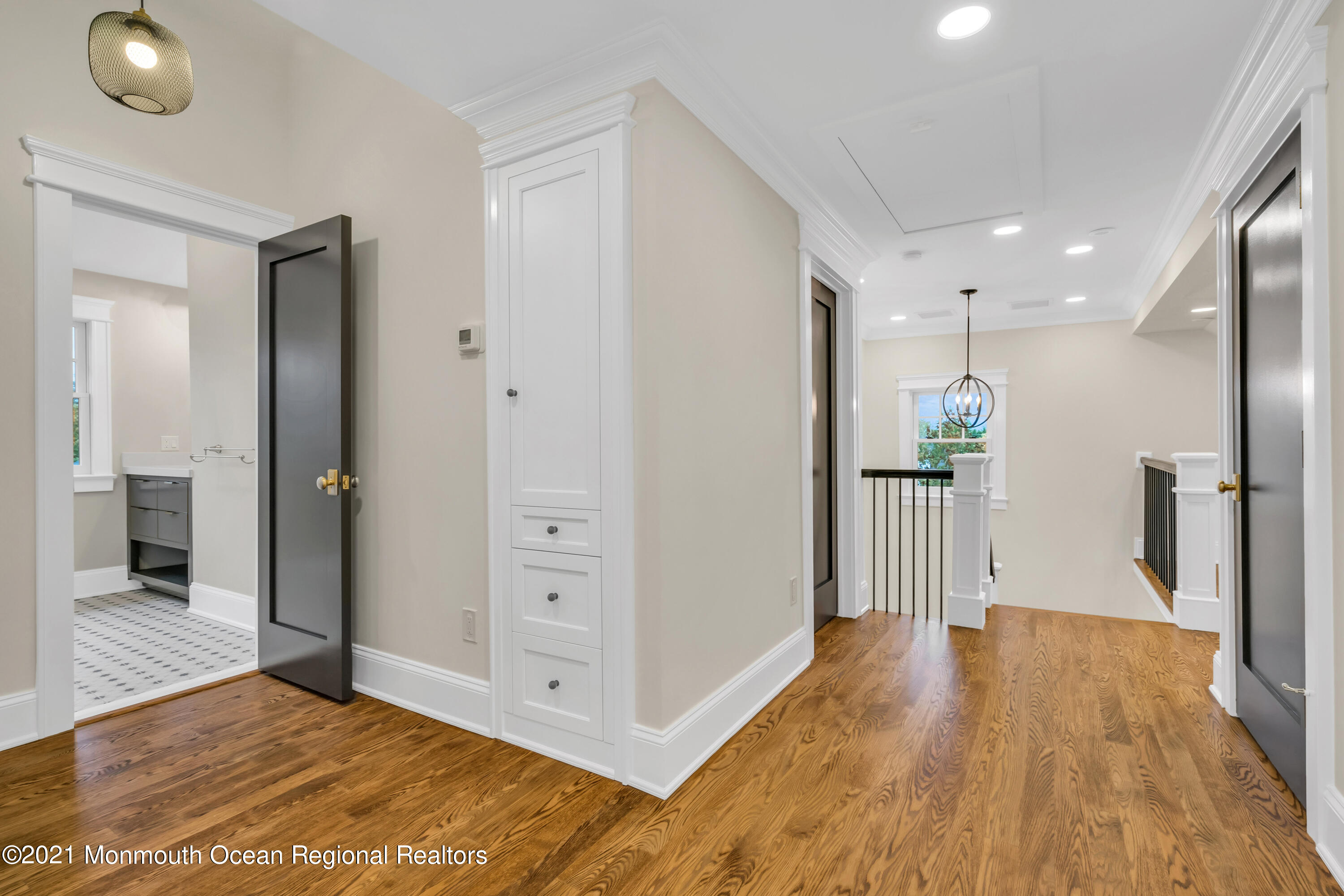 222 Cedar Avenue Allenhurst, NJ 07711 - Photo 55 of 73 a view of a hallway with wooden floor