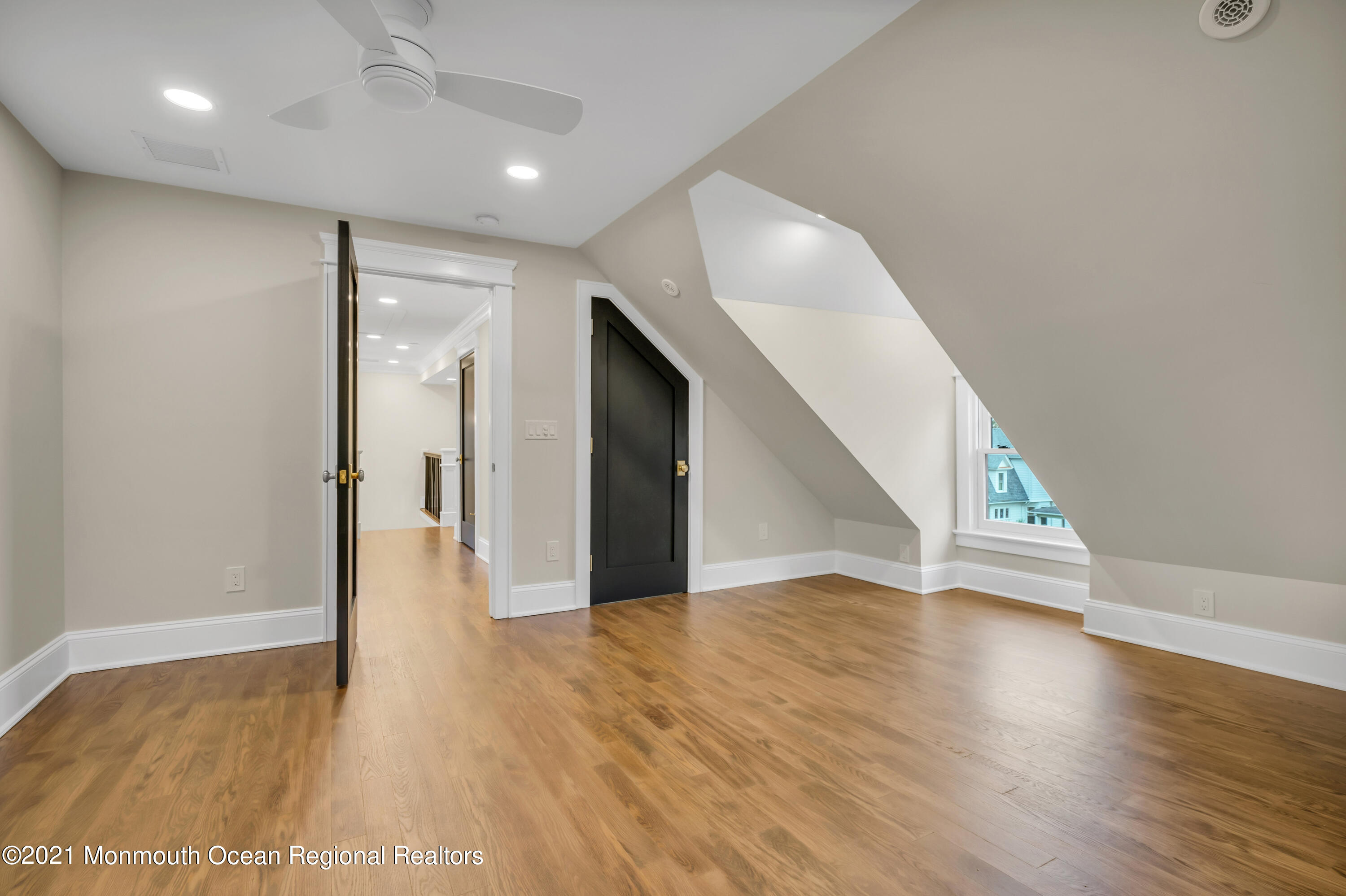 222 Cedar Avenue Allenhurst, NJ 07711 - Photo 57 of 73 a view of empty room with wooden floor