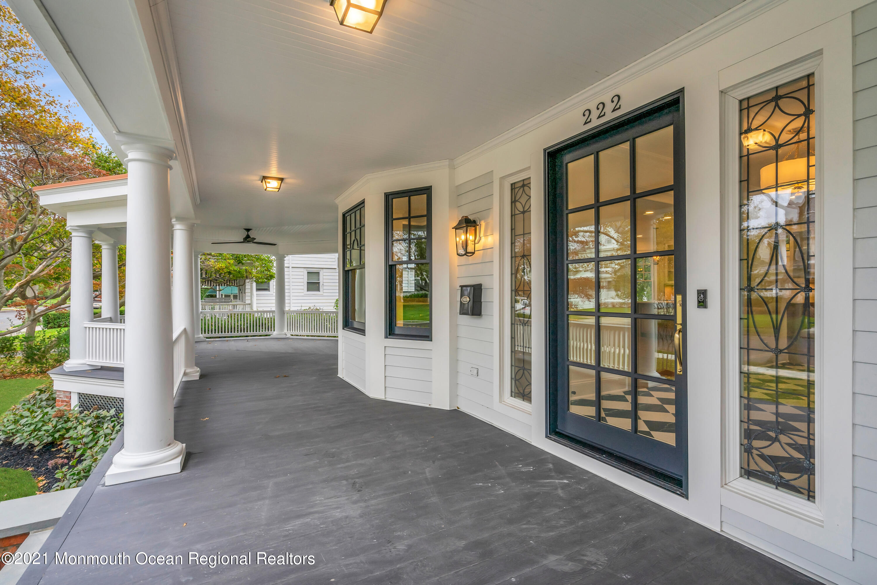 222 Cedar Avenue Allenhurst, NJ 07711 - Photo 7 of 73 a view of an entryway with wooden floor and garden