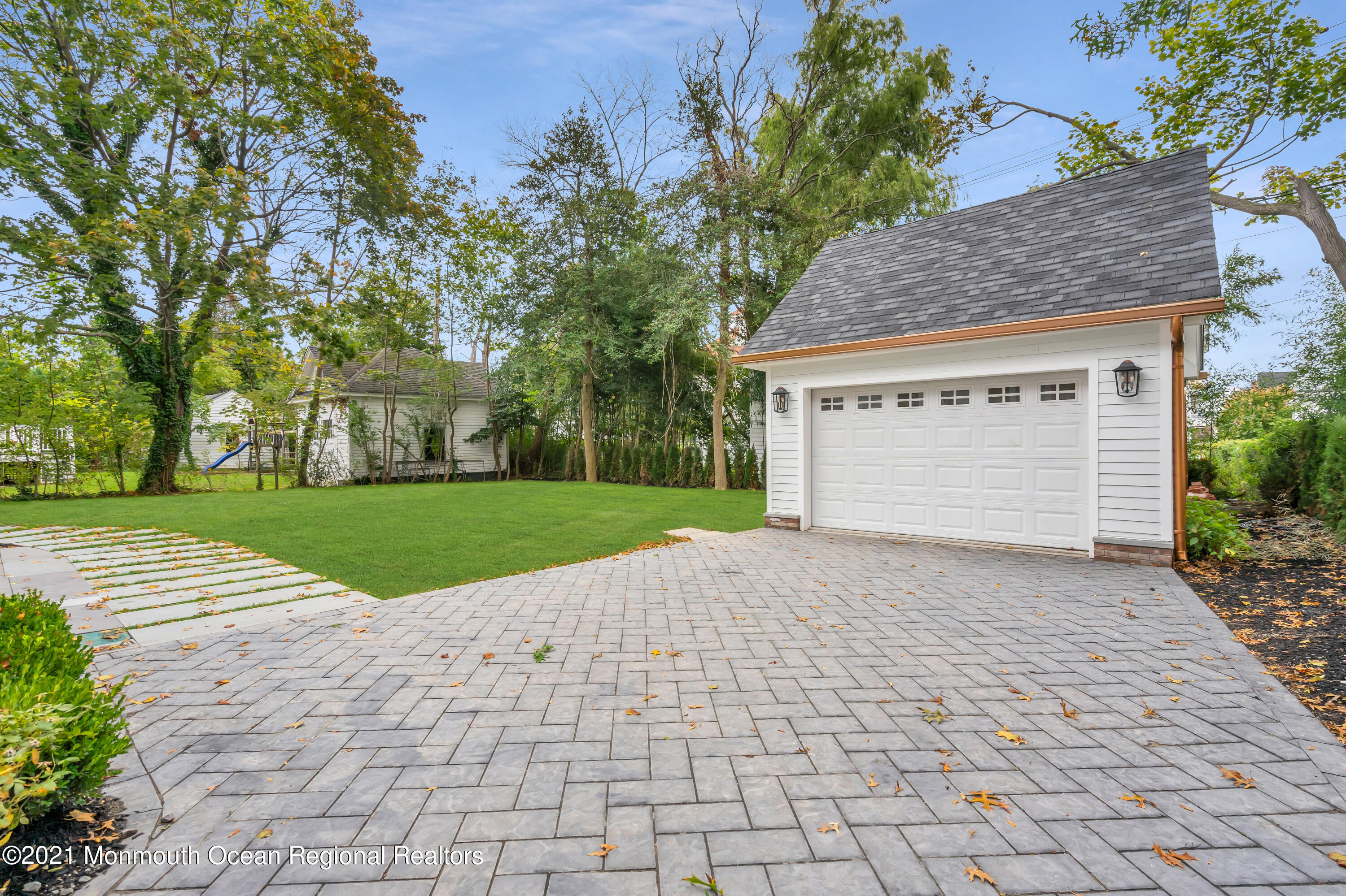 222 Cedar Avenue Allenhurst, NJ 07711 - Photo 68 of 73 a front view of house with yard