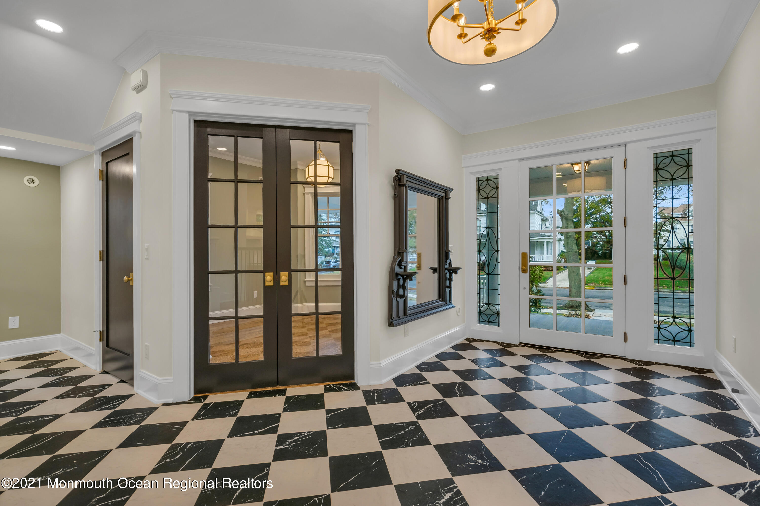 222 Cedar Avenue Allenhurst, NJ 07711 - Photo 10 of 73 a black and white checkered floor with a black white checkered floor next to a window