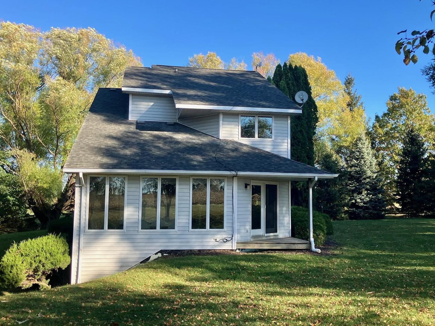 7561 West Judson Road Polo, IL 61064 - Photo 30 of 44 front view of a house with a yard