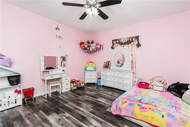 a bedroom with furniture and a bed