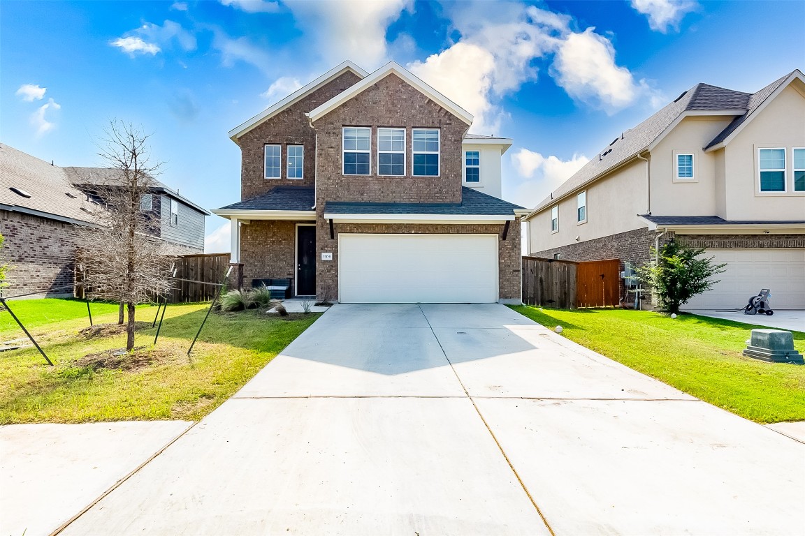 a front view of house with yard