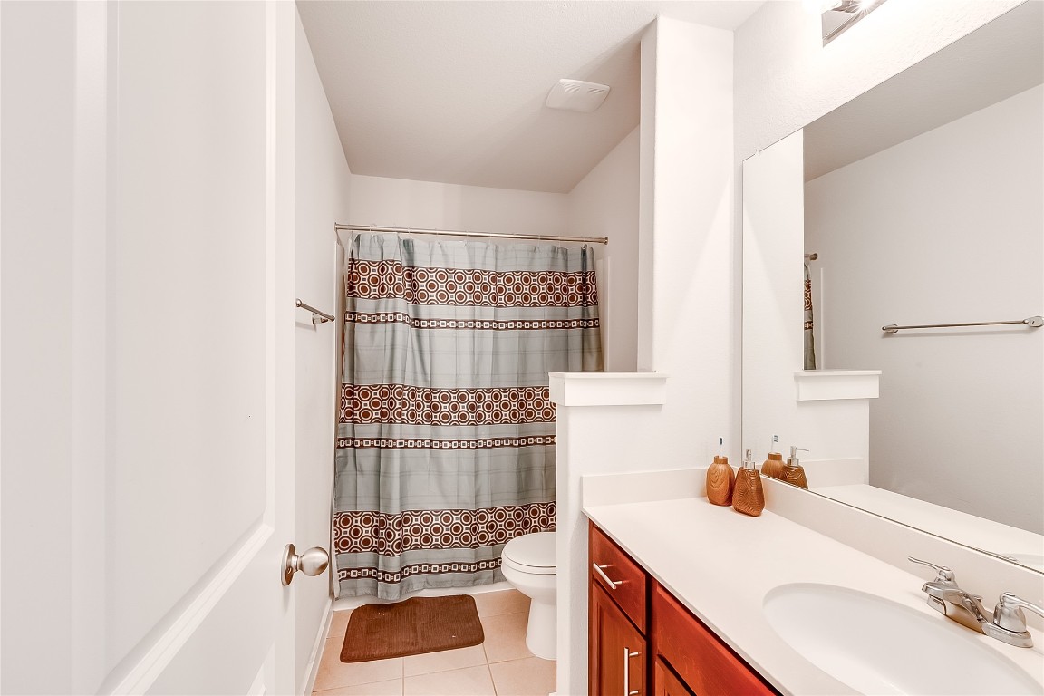 1104 Terrace View Georgetown, TX 78628 - Photo 23 of 36 a bathroom with a sink and a mirror