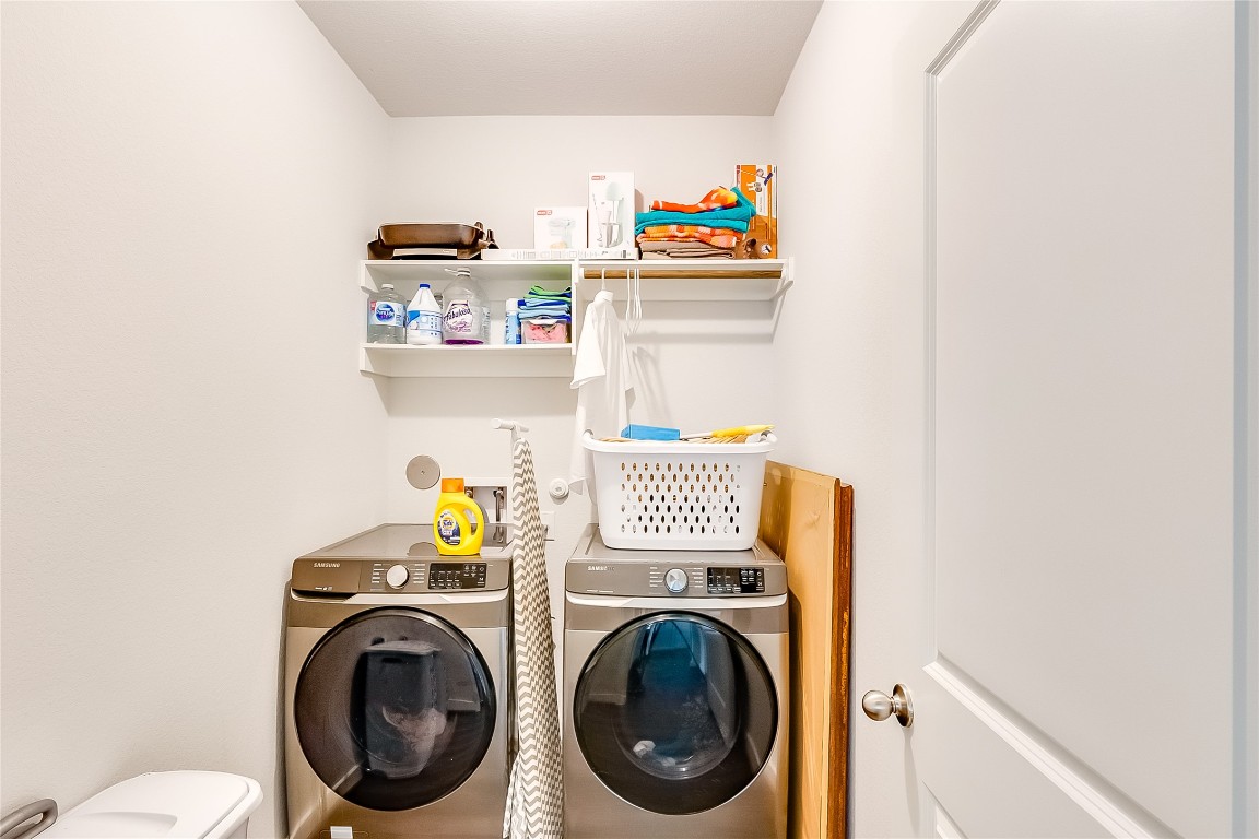 1104 Terrace View Georgetown, TX 78628 - Photo 25 of 36 a utility room with dryer and washer