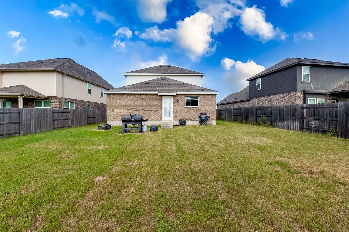 1104 Terrace View Georgetown, TX 78628 - Photo 27 of 36 a house view with a sitting space and garden