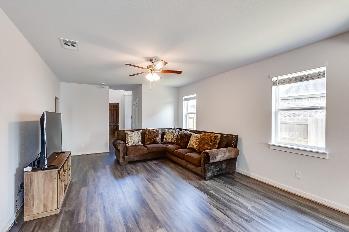 1104 Terrace View Georgetown, TX 78628 - Photo 7 of 36 a living room with furniture and a flat screen tv