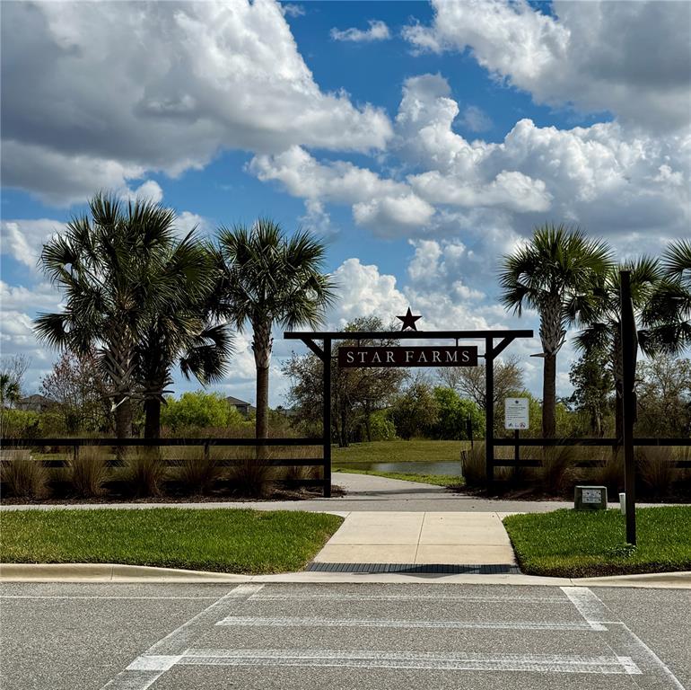 3222 Bitterroot Lane Bradenton, FL 34211 - Photo 2 of 12 a view of a yard in front of a house