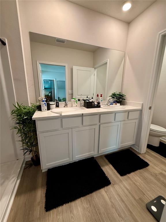 3222 Bitterroot Lane Bradenton, FL 34211 - Photo 7 of 12 a room with a sink mirror and window