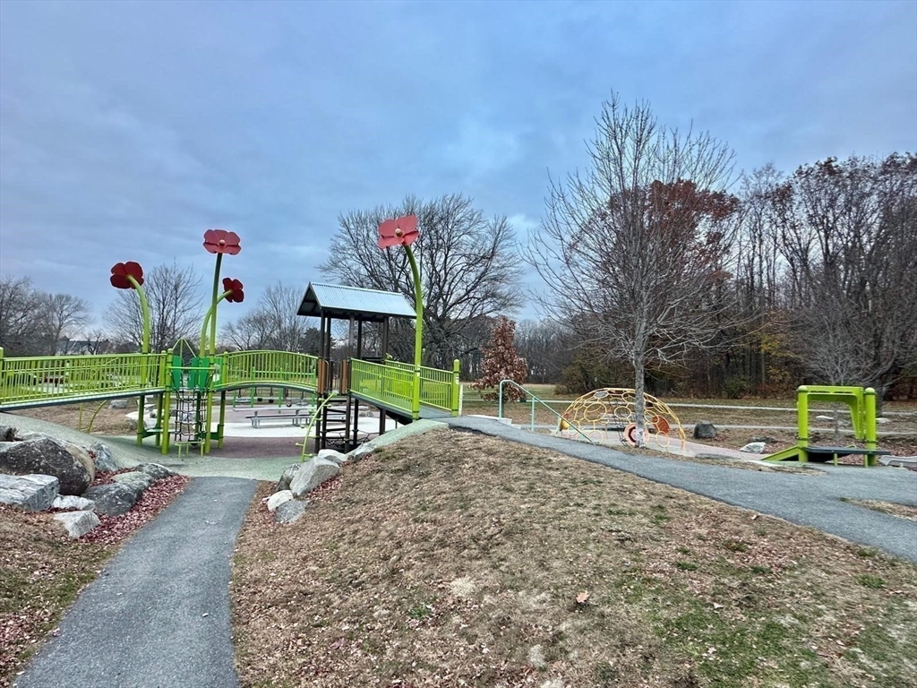363 Hildreth Street, Unit 11 Lowell, MA 01850 - Photo 11 of 17 a view of a park with swings and slides
