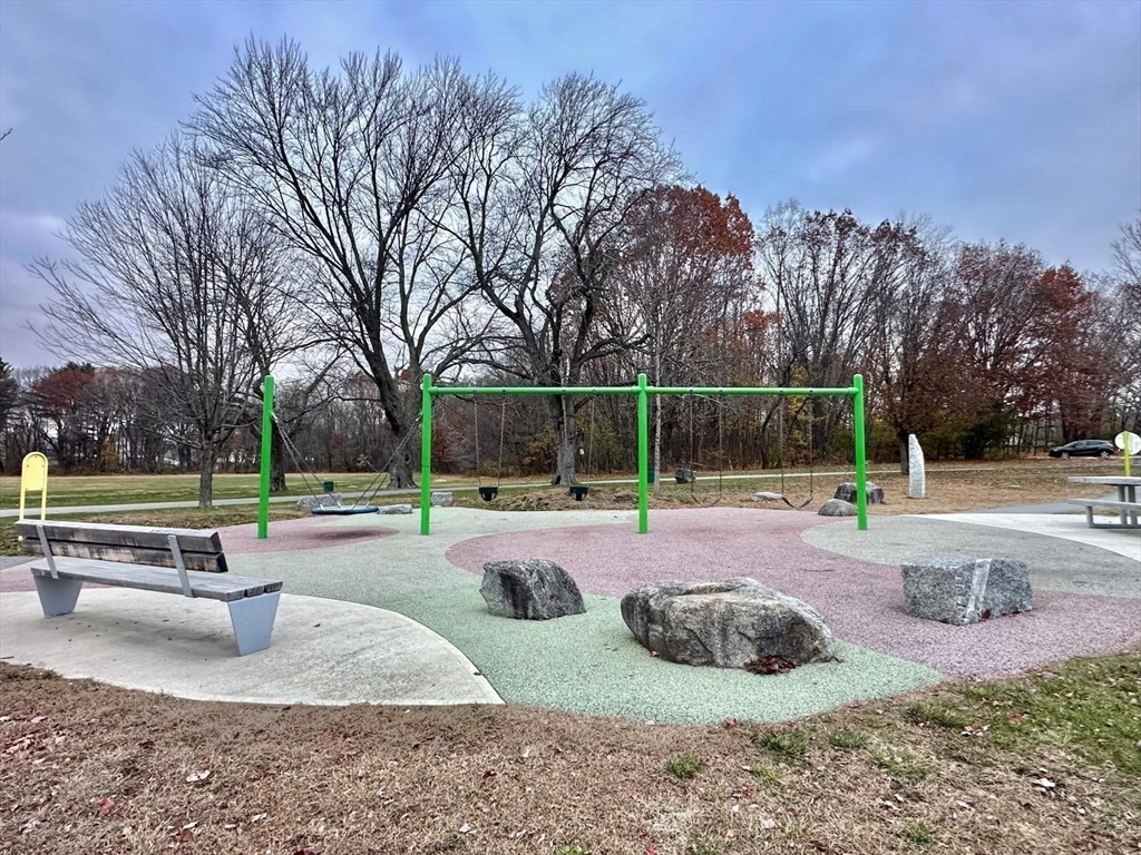 363 Hildreth Street, Unit 11 Lowell, MA 01850 - Photo 15 of 17 a view of a backyard with swimming pool