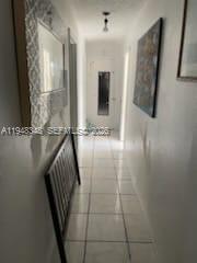 1489 West 34th Street Riviera Beach, FL 33404 - Photo 4 of 6 a view of a hallway