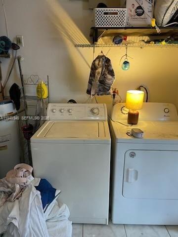 1489 West 34th Street Riviera Beach, FL 33404 - Photo 6 of 6 a bathroom with a sink and a mirror