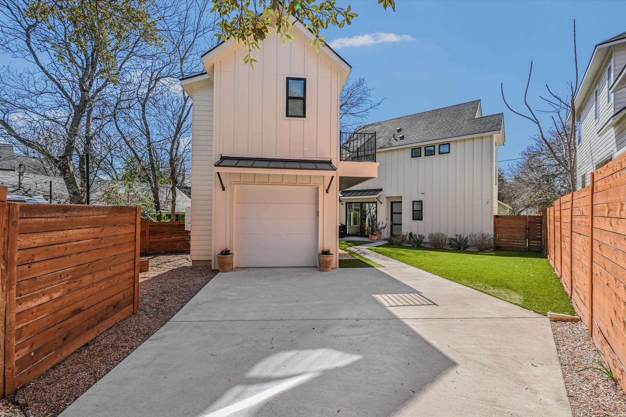 Welcome home!  Enjoy the central Austin lifestyle in this beautiful property.  With two separate buildings, you have the ultimate flexibility!  The main home is a spacious 2 bedroom/2.5 bath home, PLUS a heated/cooled garage with a spacious bedroom and full bath on top of the garage!