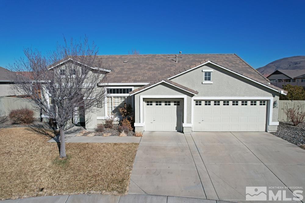 1795 Arrow Wood Court Reno, NV 89521 - Photo 1 of 40 a view of a house with a snow in the background